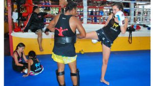 girls training muay thai