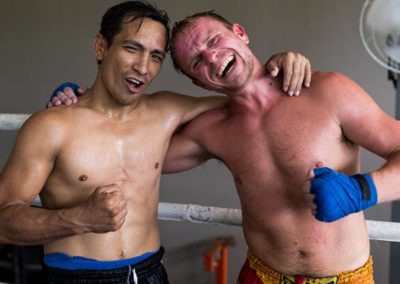 trainer and student in the boxing ring