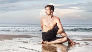 yoga pose in the beach